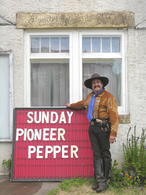 Pioneer Pepper with a sign  Dusty Cartride on cowboy poetry